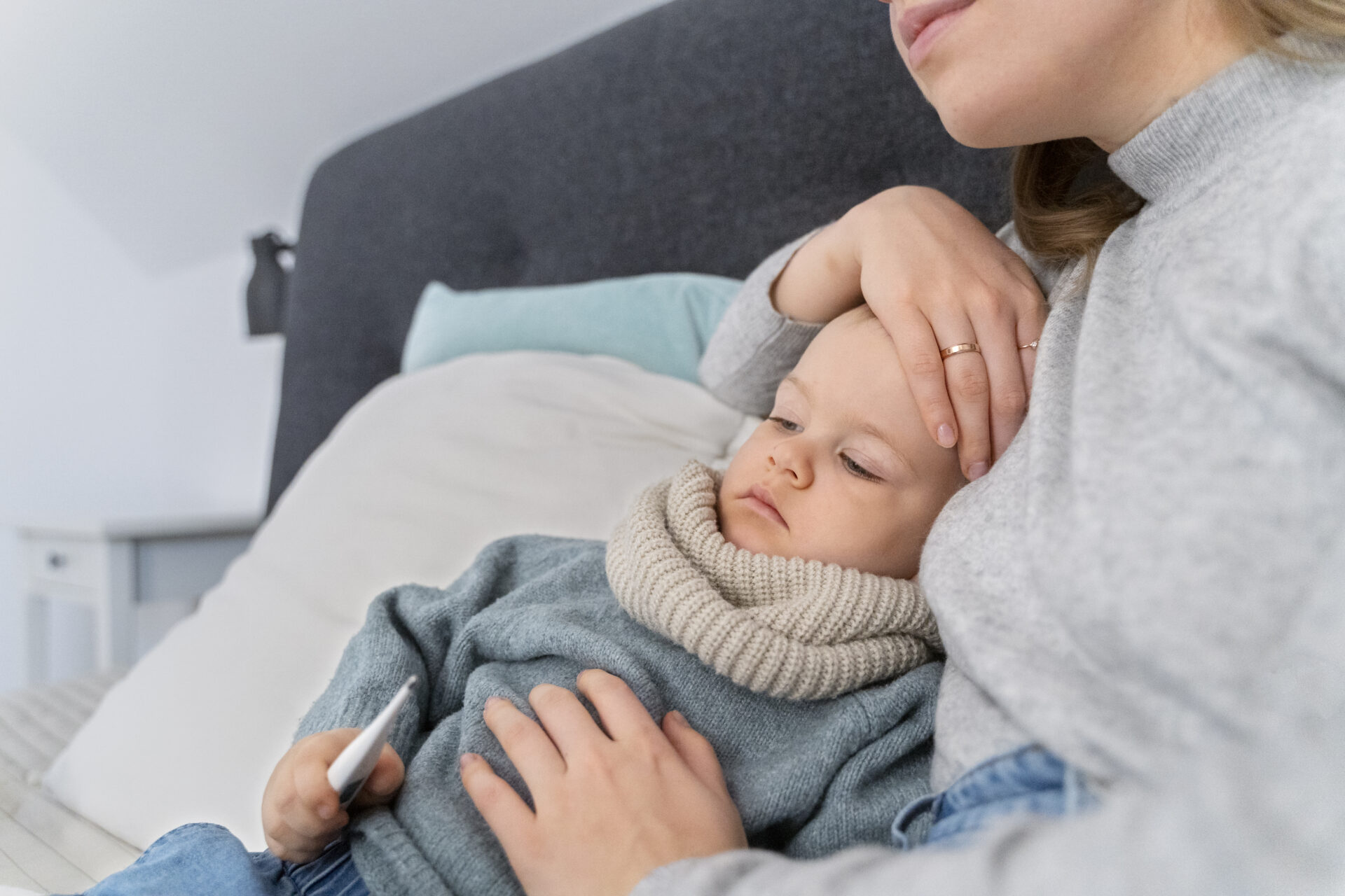 mom-taking-care-her-child-teleconsulting-with-doctor.jpg